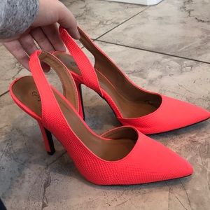 Neon coral point toe pumps